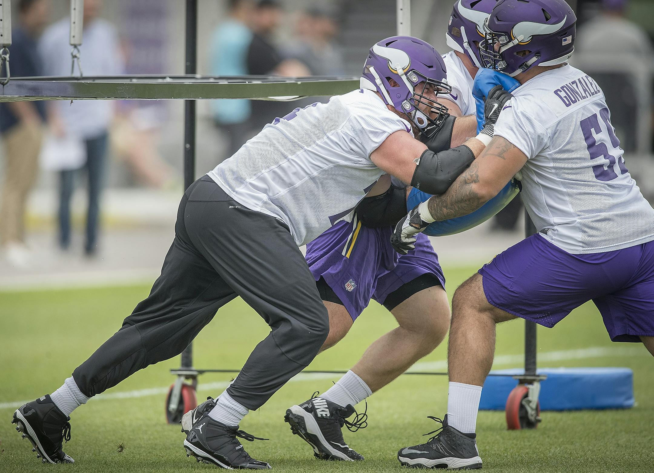 Vikings tackle Mike Remmers, left, took part in minicamp at the TCO Vikings Performance Center