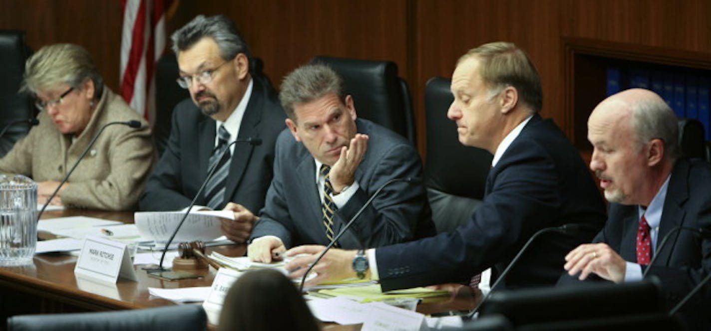 Members of the State Canvassing Board, from left, Judge Kathleen Gearin, Chief Justice Eric Magnuson, Secretary of State Mark Ritchie, Associate Justice G. Barry Anderson and Judge Edward Cleary during deliberations in November