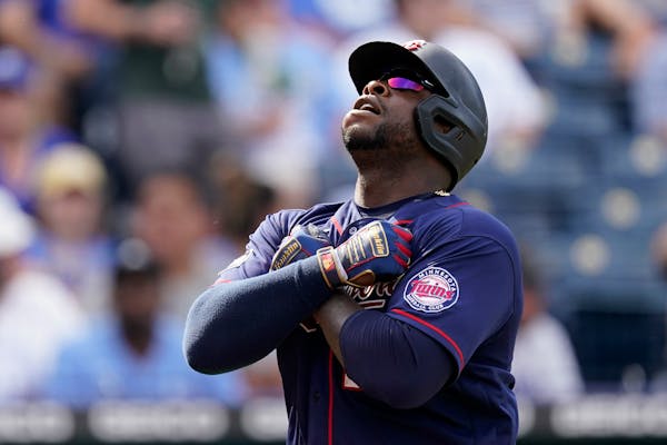 Minnesota Twins' Miguel Sano celebrates after hitting a two-run home run during the sixth inning of a baseball game against the Kansas City Royals Sat