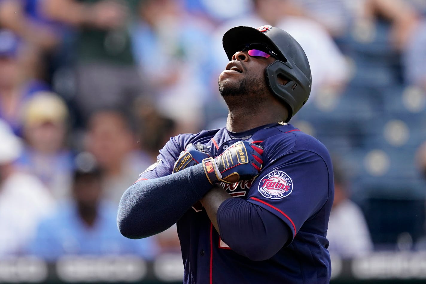 Minnesota Twins' Miguel Sano celebrates after hitting a two-run home run during the sixth inning of a baseball game against the Kansas City Royals Saturday, June 5, 2021, in Kansas City, Mo. (AP Photo/Charlie Riedel)