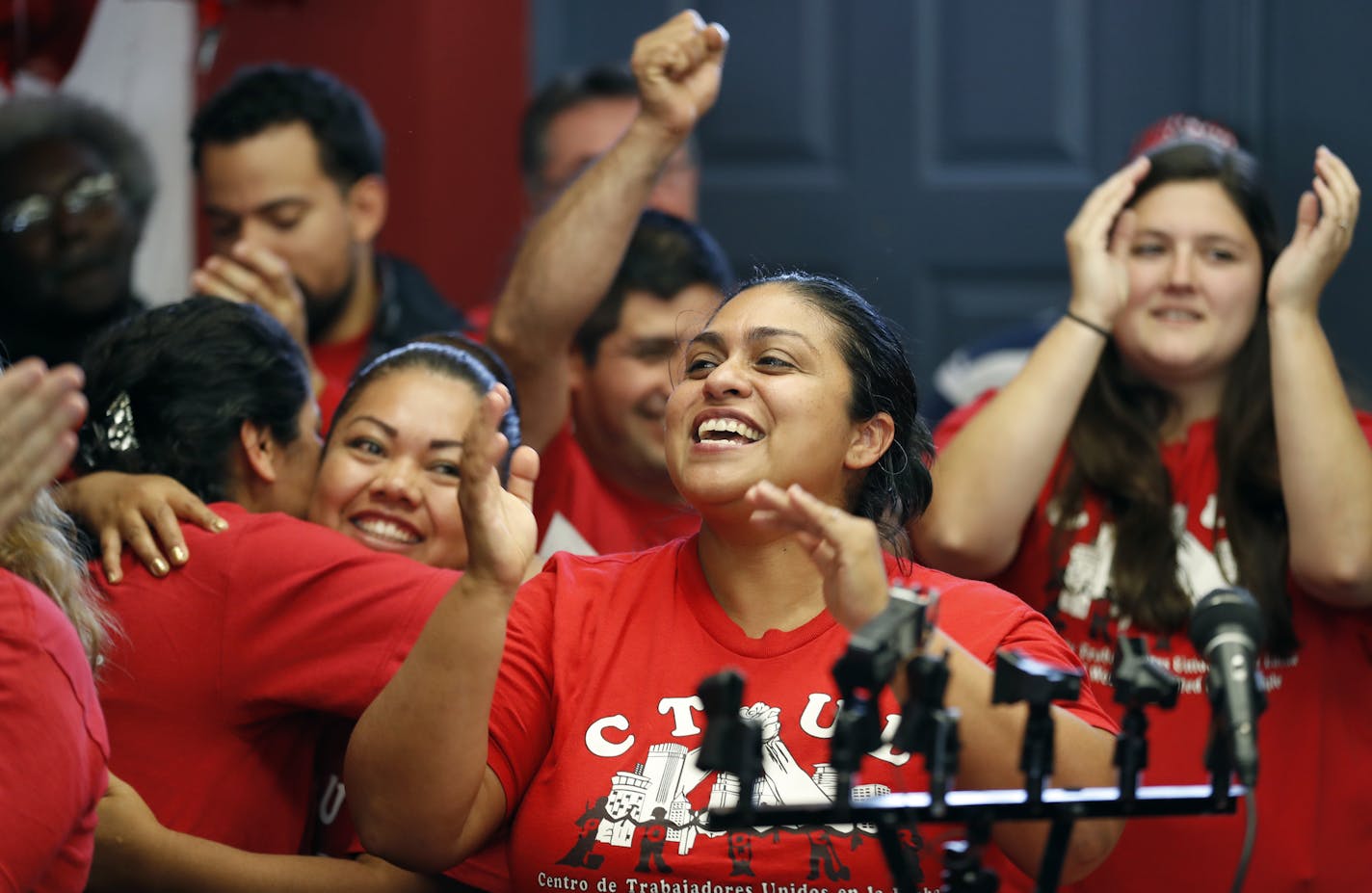 Veronica Mendez Moore celebrated the announcement that janitors who clean Target stores have won the right to organize under the SEIU Local 26 janitors union at the CTUL union hall Thursday October 13, 2016 in Minneapolis, MN. ] Jerry Holt / jerry. Holt@Startribune.com