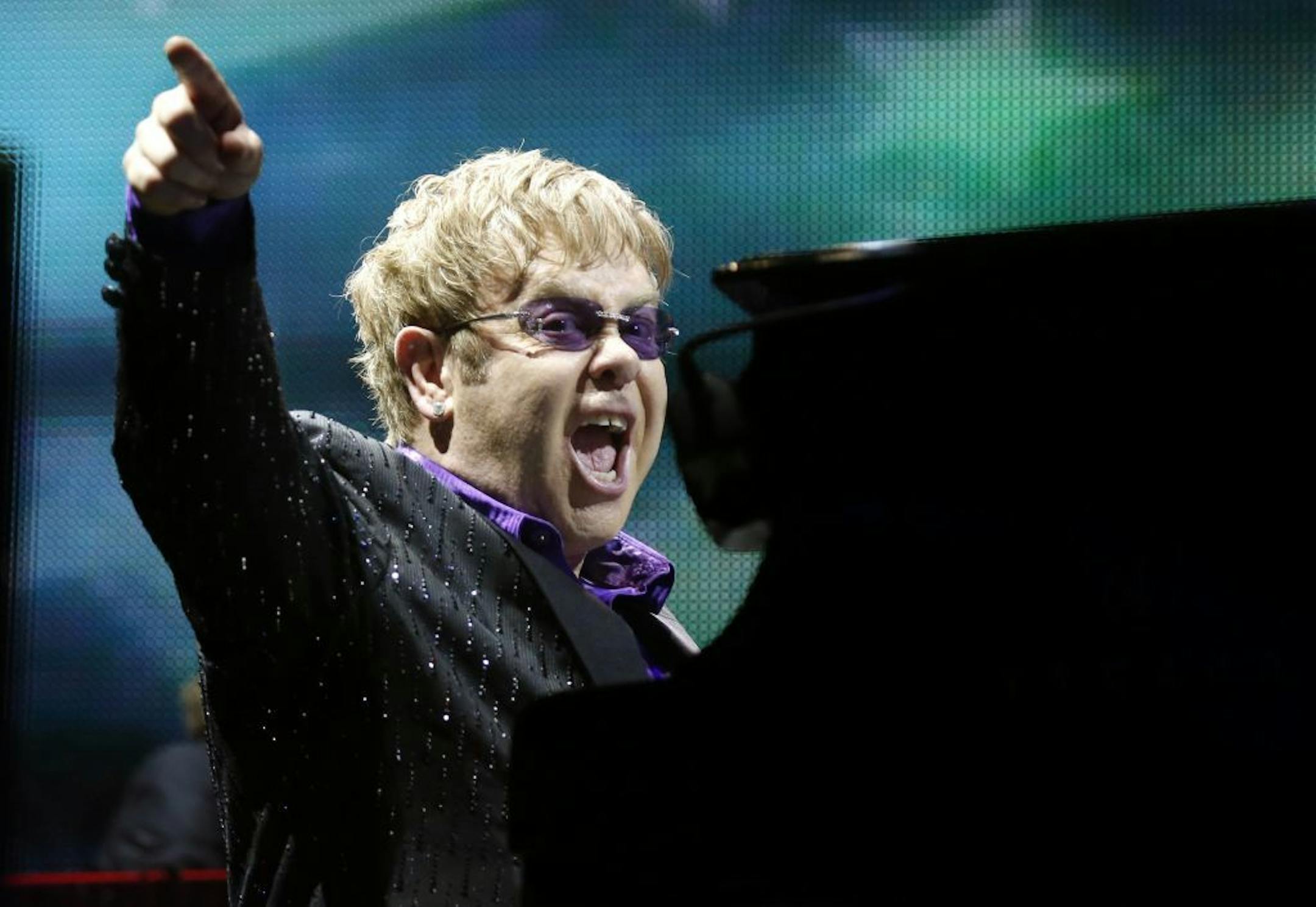 This June 30, 2012 file photo shows British pop star Elton John performing during the Euro 2012 soccer championship in Kiev, Ukraine.