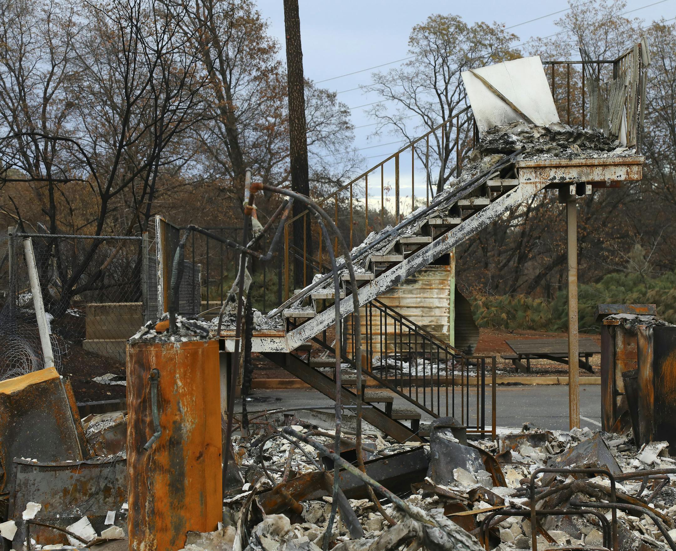 A home destroyed by the Camp Fire in Paradise, Calif., Nov. 26, 2018. Heavy metals, chemicals and biological contaminants left behind demand a cleanup of extraordinary scale, before any return to Paradise is safe. (Jim Wilson/The New York Times)