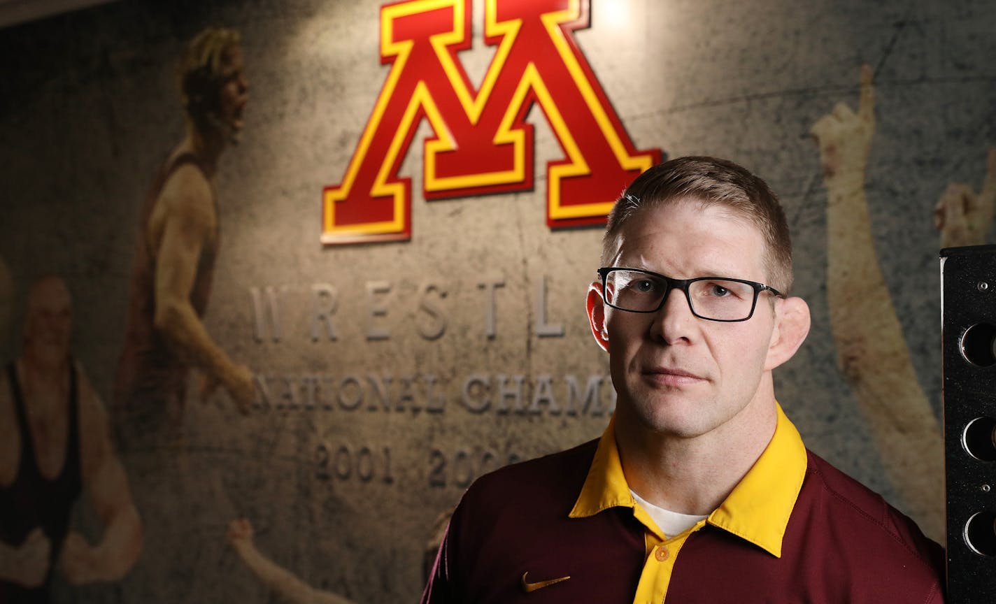 Brandon Eggum, the new wrestling coach for the University of Minnesota's Golden Gophers, stands for a portrait in the university's wrestling room Wednesday. ] ANTHONY SOUFFLE &#x2022; anthony.souffle@startribune.com Feature on new Gophers wrestling coach Brandon Eggum photographed Wednesday, Jan. 4, 2017 at