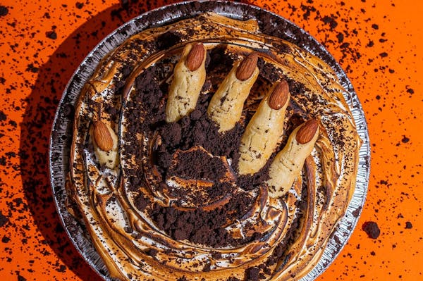 Let Hot Hands Pie & Biscuit give your festivities a literal hand with this cookie and marshmallow fluff filled pie.