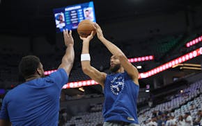 Timberwolves center Rudy Gobert (27) shoots during warmups before facing the Oklahoma City Thunder at Target Center in Minneapolis, on Saturday May 25