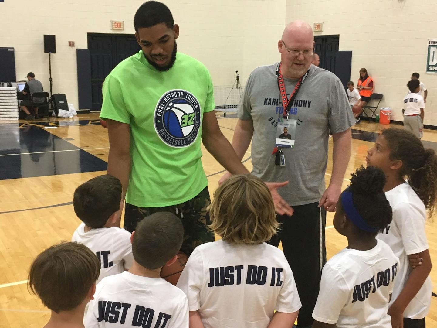 Timberwolves' center Karl-Anthony Towns addresses kids at his basketball camp Wednesday at Providence Academy in Plymouth.