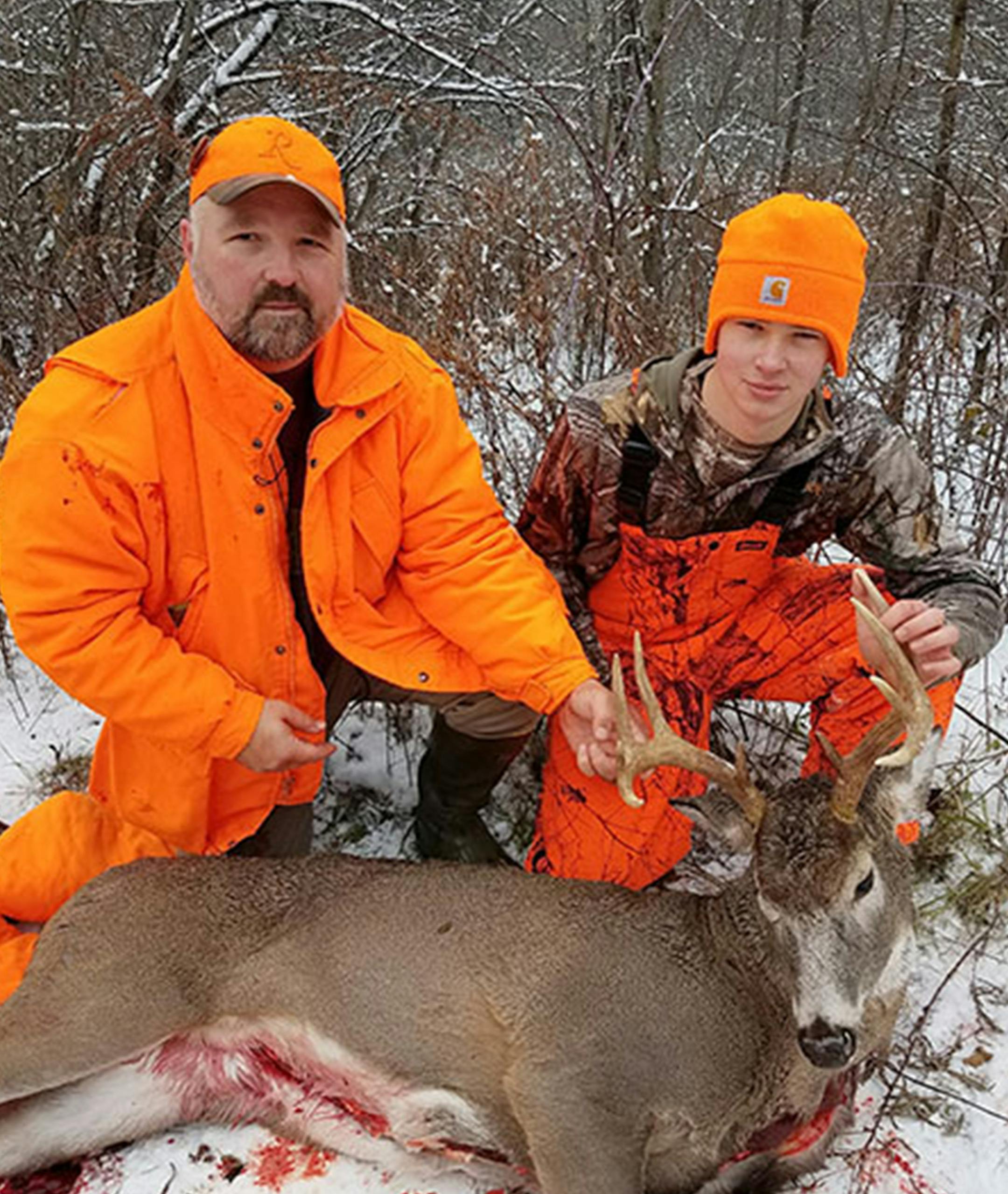 Craig Ihrke, left, of Chatfield, posed with 16-year-old Luke after Luke harvested the buck he'd seen on his trail camera. The buck was the first deer to test positive for CWD in Houston County, long known in Minnesota as home to big bucks.