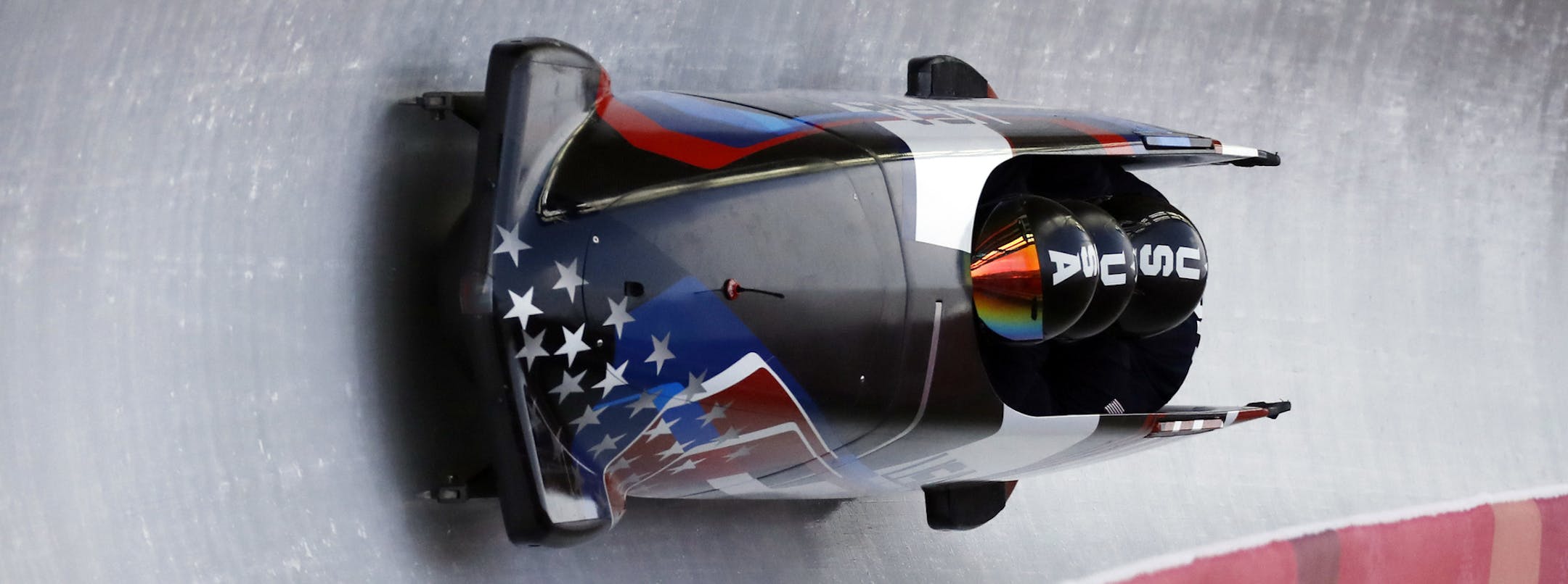 Driver Codie Bascue, Steven Langton, Samuel Mc Guffie and Evan Weinstock of the United States take a curve during training for the four-man bobsled competition at the 2018 Winter Olympics in Pyeongchang, South Korea, Friday, Feb. 23, 2018. (AP Photo/Andy Wong)