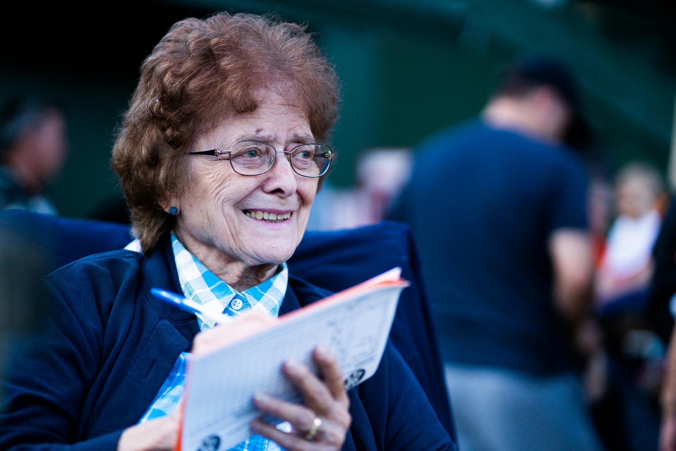 87-year-old Doris Zwach keeps score at the Yankees' game against Spicer. She's been keeping score since her husband, Bob Zwach, Sr., managed the team.