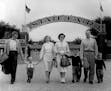 August 23, 1958 First Families: Early arrivals on the opening morning of the Minnesota State fair today were these two Minneapolis families. At left a