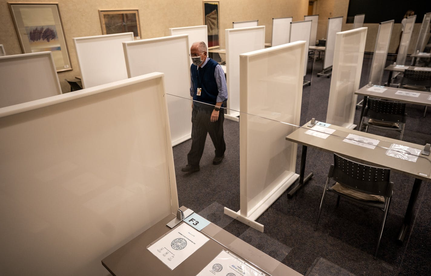 Allina Health's Infectious disease specialist Dr. Frank Rhame explains the process for the upcoming COVID vaccine clinical trial. The interview process will by held in the Heilicher Auditorium, only 20 people will be allowed in the space that is proper distance apart for social distances protocols . ] Jerry Holt •Jerry.Holt@startribune.com Allina Health's Infectious Disease Research team has been hard at work setting up the Phase 3 clinical trial site for Janssen's (Johnson & Johnson) ENSEMBLE S