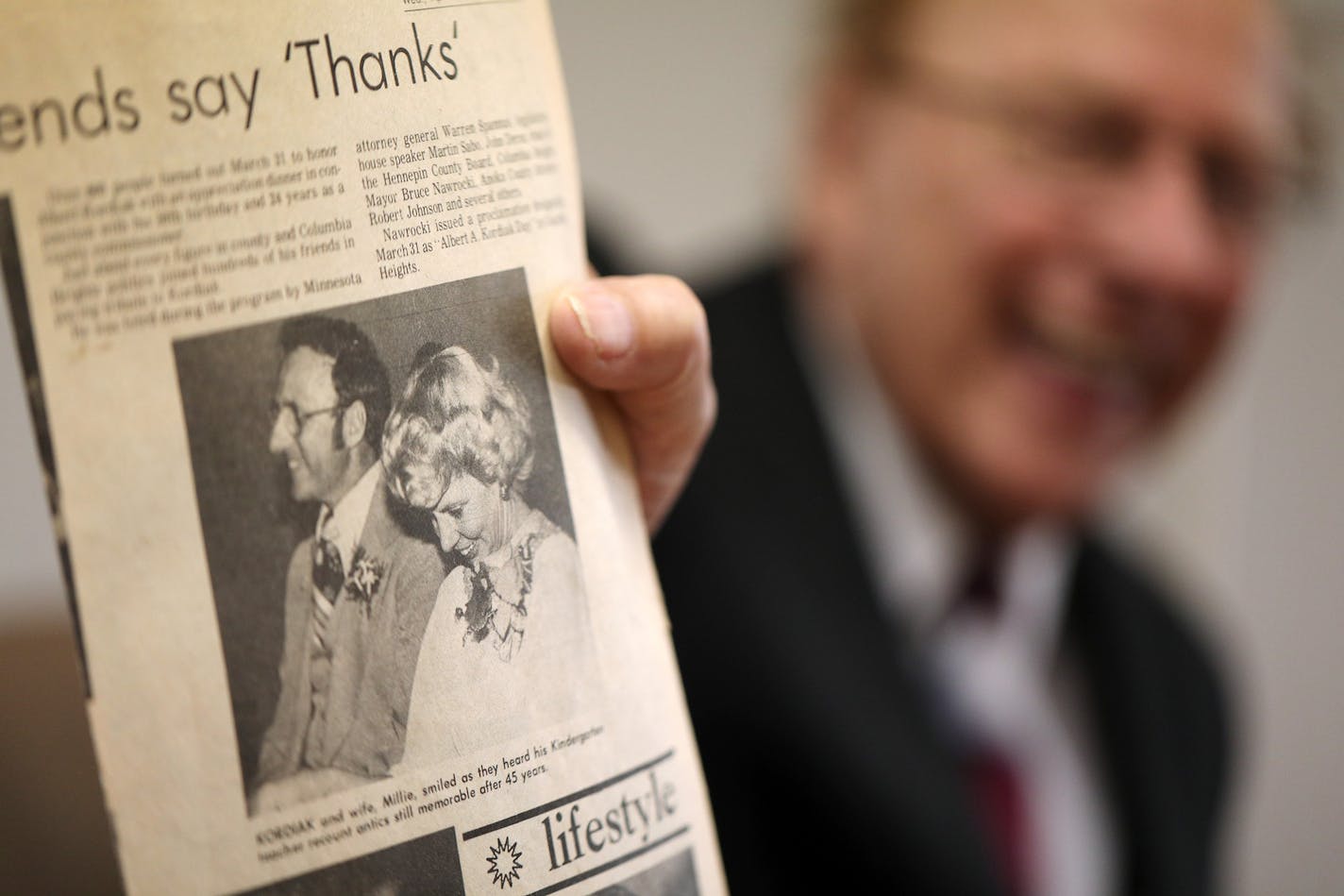 Al Kordiak held up a copy of a newspaper he and his wife Millie were featured in during their younger days.