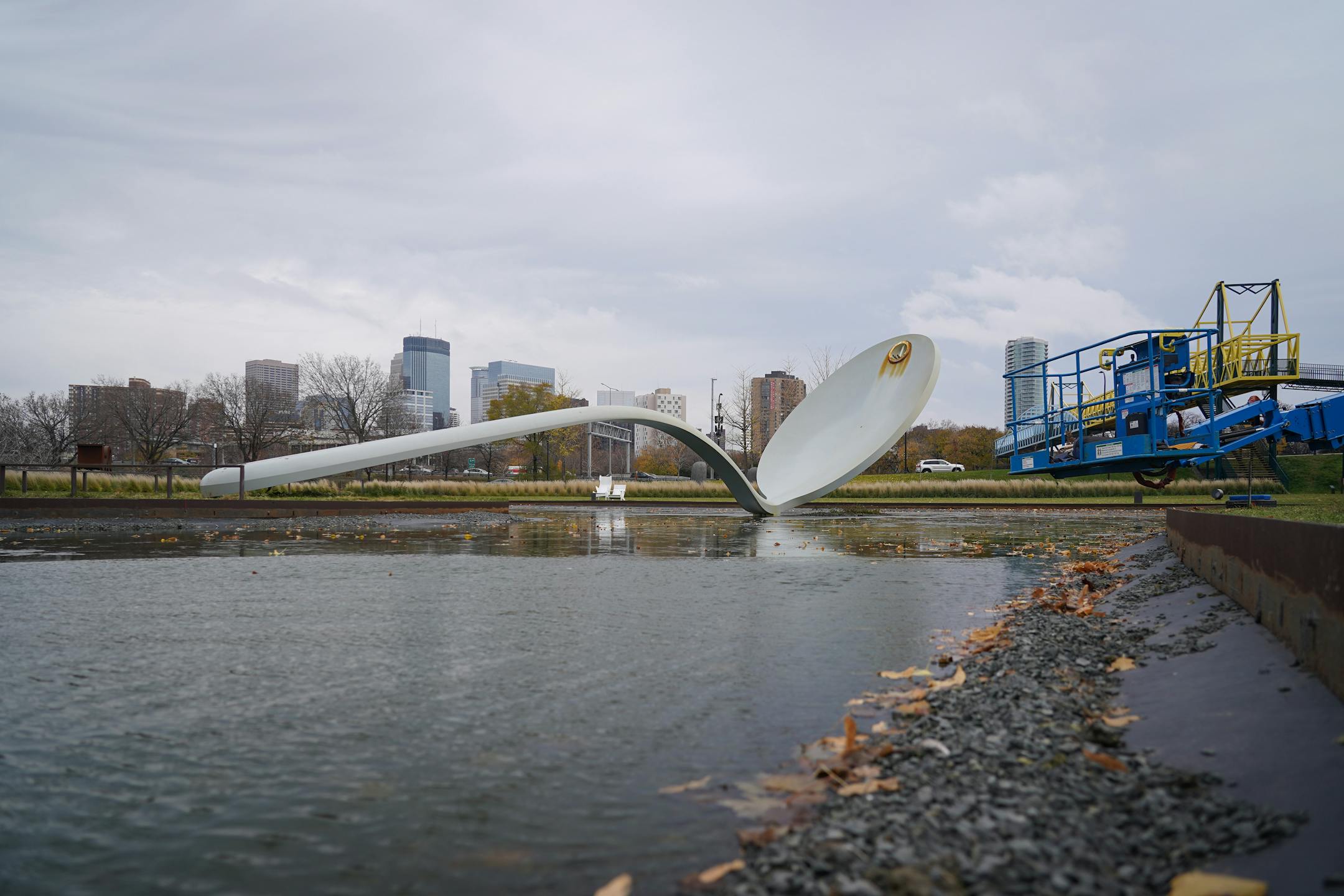 The 17500 pound aluminum cherry ball is unbolted, lifted, and separated from the Spoonbridge base it sits atop at the Sculpture Garden in Minneapolis, Minn., on Tuesday, Nov. 16, 2021. Due to the typically harsh conditions of Minnesota winters, this iconic Minneapolis fruit requires a fresh coat of paint about every ten years to keep the cherry's red crisp and glossy. ] SHARI L. GROSS • shari.gross@startribune.com