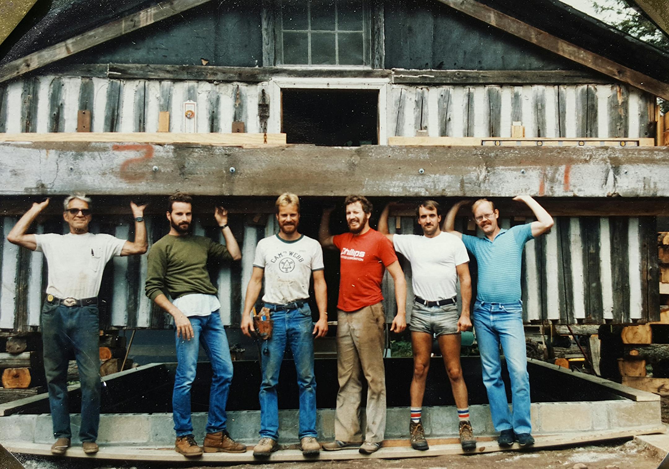 With six screw jacks, the cabin was jacked up. Then, they poured a footing, set two rows of block, built a deck and set the cabin back down in the same spot.