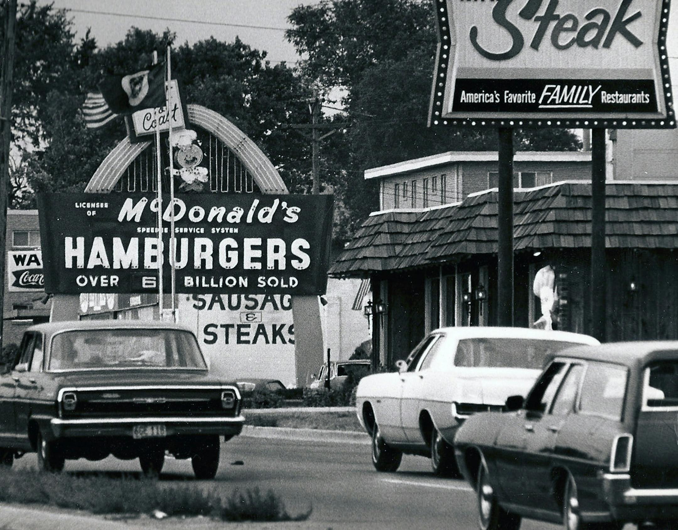 File photo shows roaw of fast-food outlets along an unspecified street in the Twin Cities.