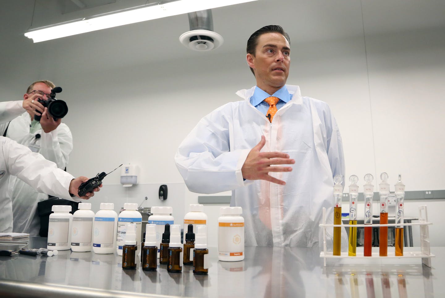 Dr. Andrew Bachman Co-founder and chief medical officer talked about some of the medical products the were extracted from marijuana plants during a tour of Leafline labs a 42,000-square-foot marijuana greenhouse and production facility Wednesday June 17, 2015 in Cottage Grove MN.] Jerry Holt/ Jerry.Holt@Startribune.com