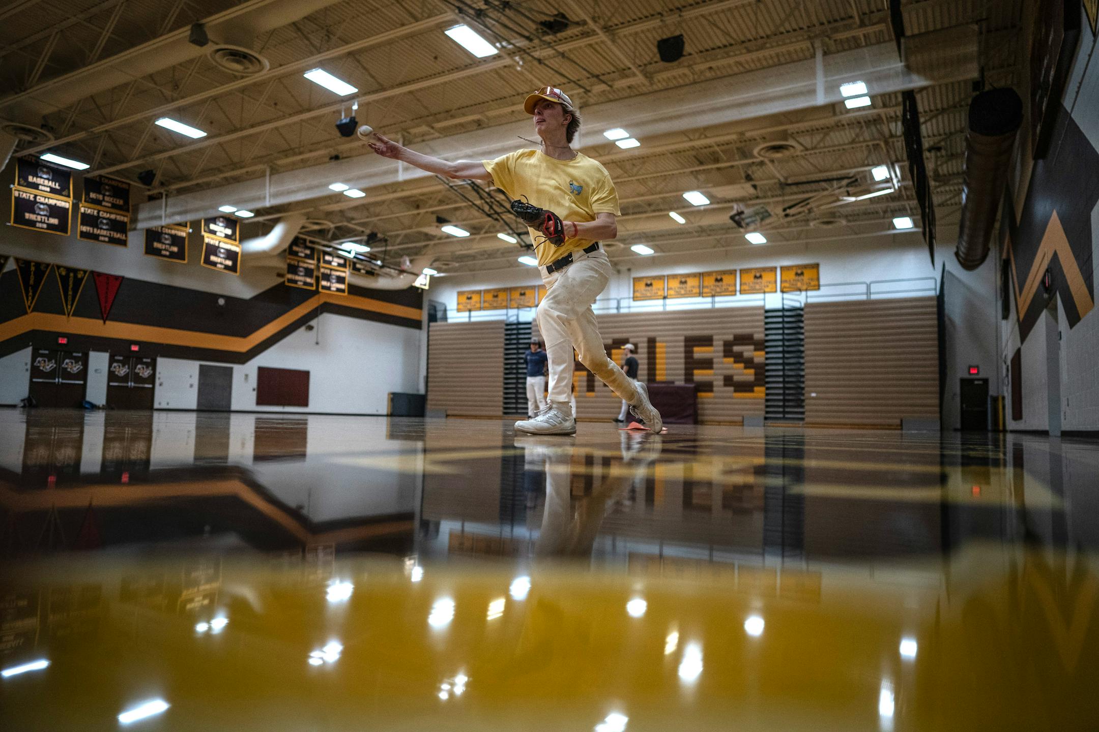 Liam Horner, a member of the Apple Valley  baseball team, during practice in the school gym.