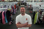 (center) Store Manager Josh Hagberg and his staff are getting ready for the grand opening of the new Salvation Army store in Fridley that will have ne