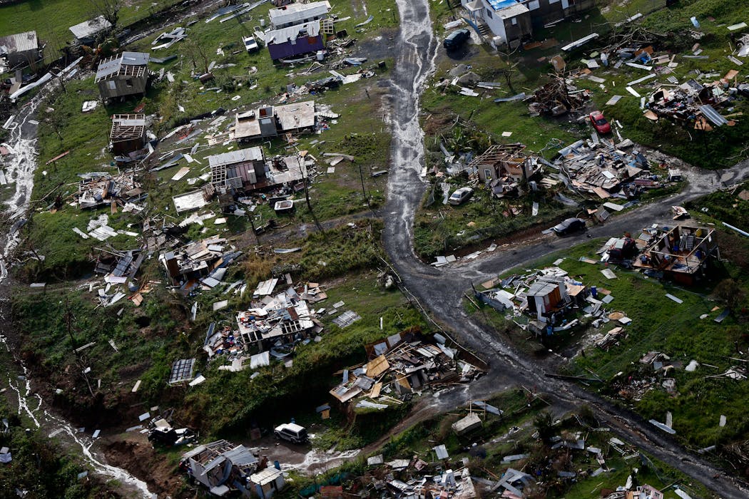 In this Sept. 28, 2017, file photo destroyed communities are seen in the aftermath of Hurricane Maria in Toa Alta, Puerto Rico.
