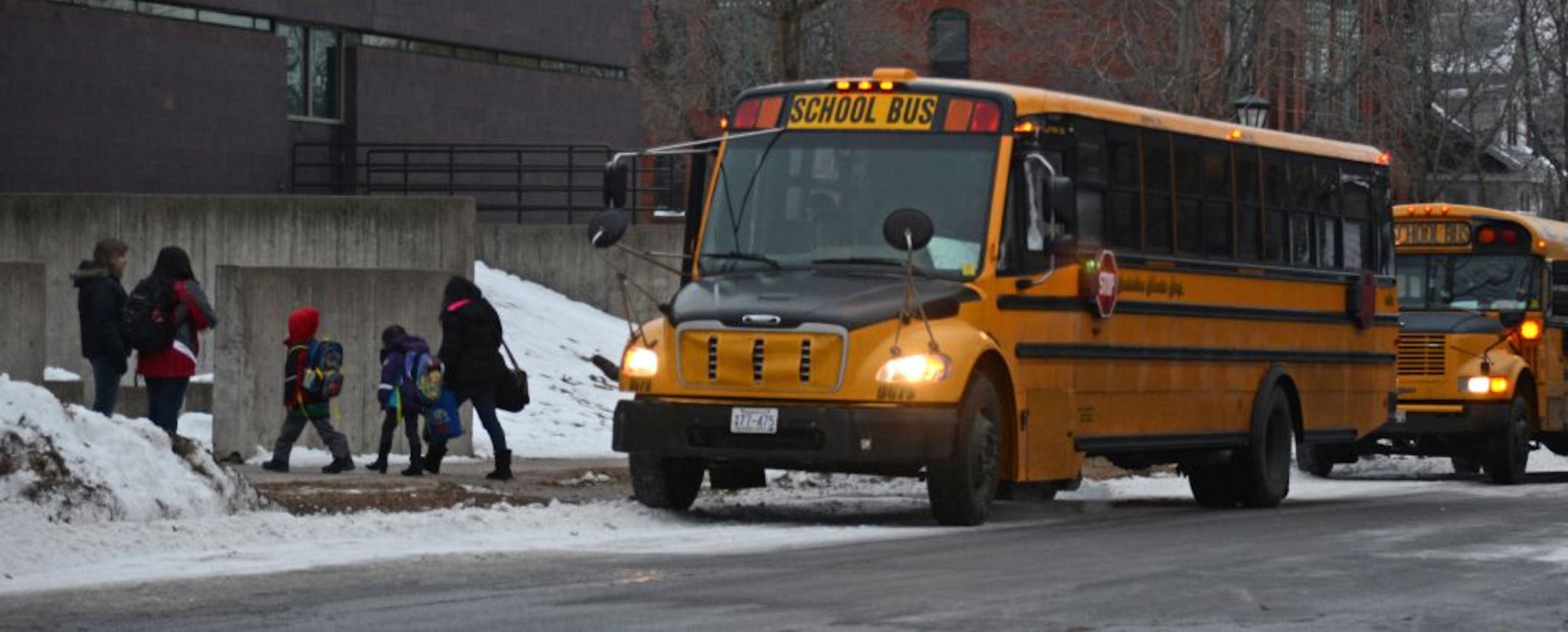 St. Paul officials say expanded bus service will make parents more likely to choose neighborhood elementary schools, which could eventually reduce costs.