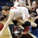 Anna Hughes (5) of Orono and Cayle Hovland (33) of Willmar chased a loose ball in the second half.