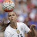 United States' Alex Morgan heads the ball agasint Haiti during the U.S. Women's World Cup victory tour, Sunday, Sept. 20, 2015, in Birmingham, Ala. (A