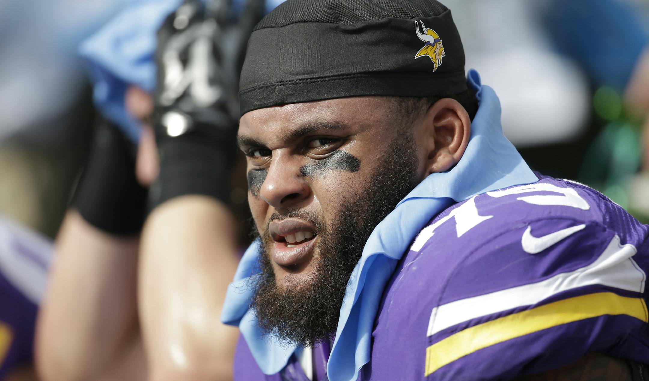 Minnesota Vikings tackle Michael Harris (79) rests on the sidelines during the first half of an NFL football game against the Miami Dolphins, Sunday, Dec. 21, 2014, in Miami Gardens, Fla. (AP Photo/Lynne Sladky) ORG XMIT: OTK