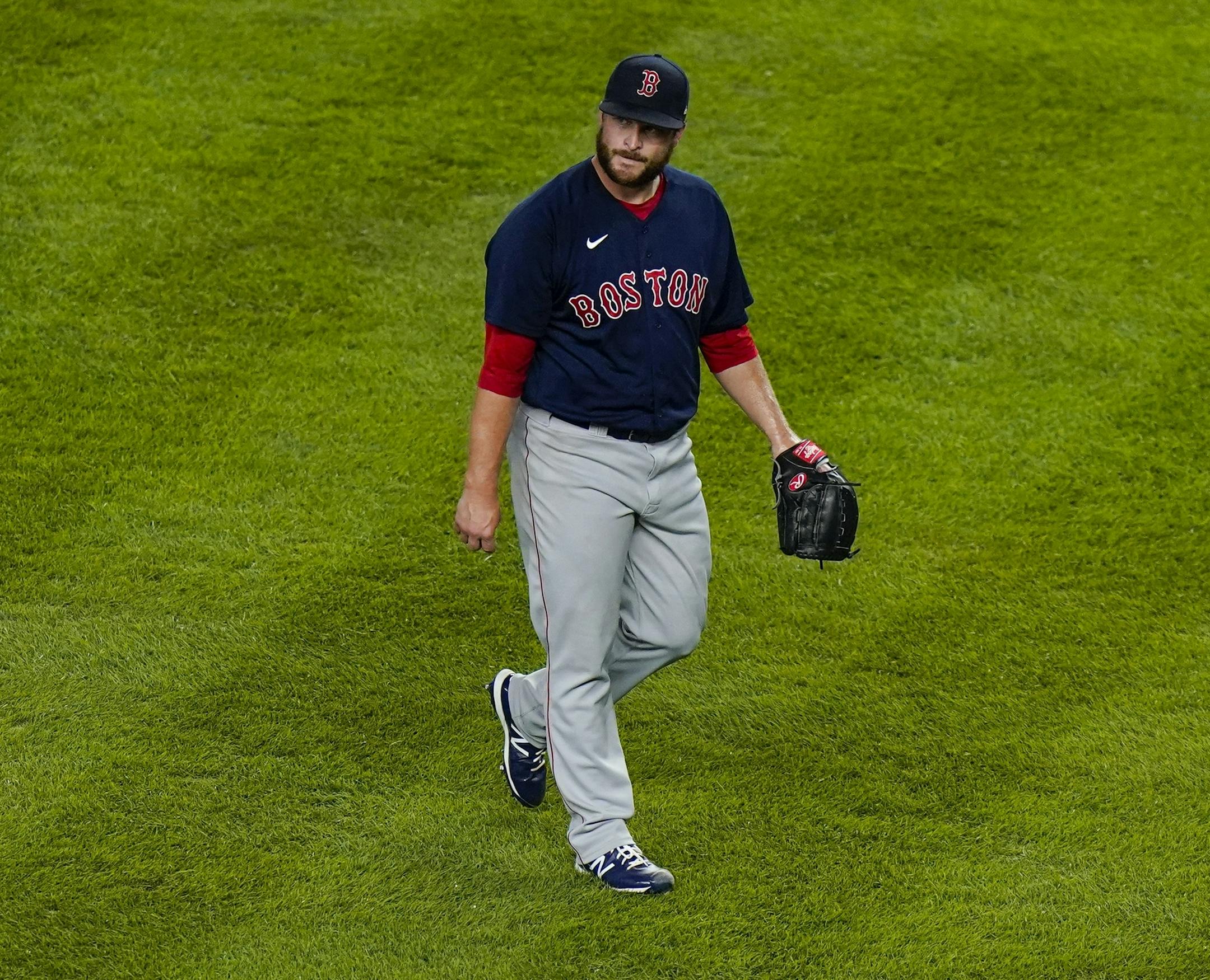 Boston Red Sox relief pitcher Ryan Brasier walks to the dugout after the fifth inning of a baseball game against the New York Yankees Friday, Aug. 14, 2020, in New York. (AP Photo/Frank Franklin II)