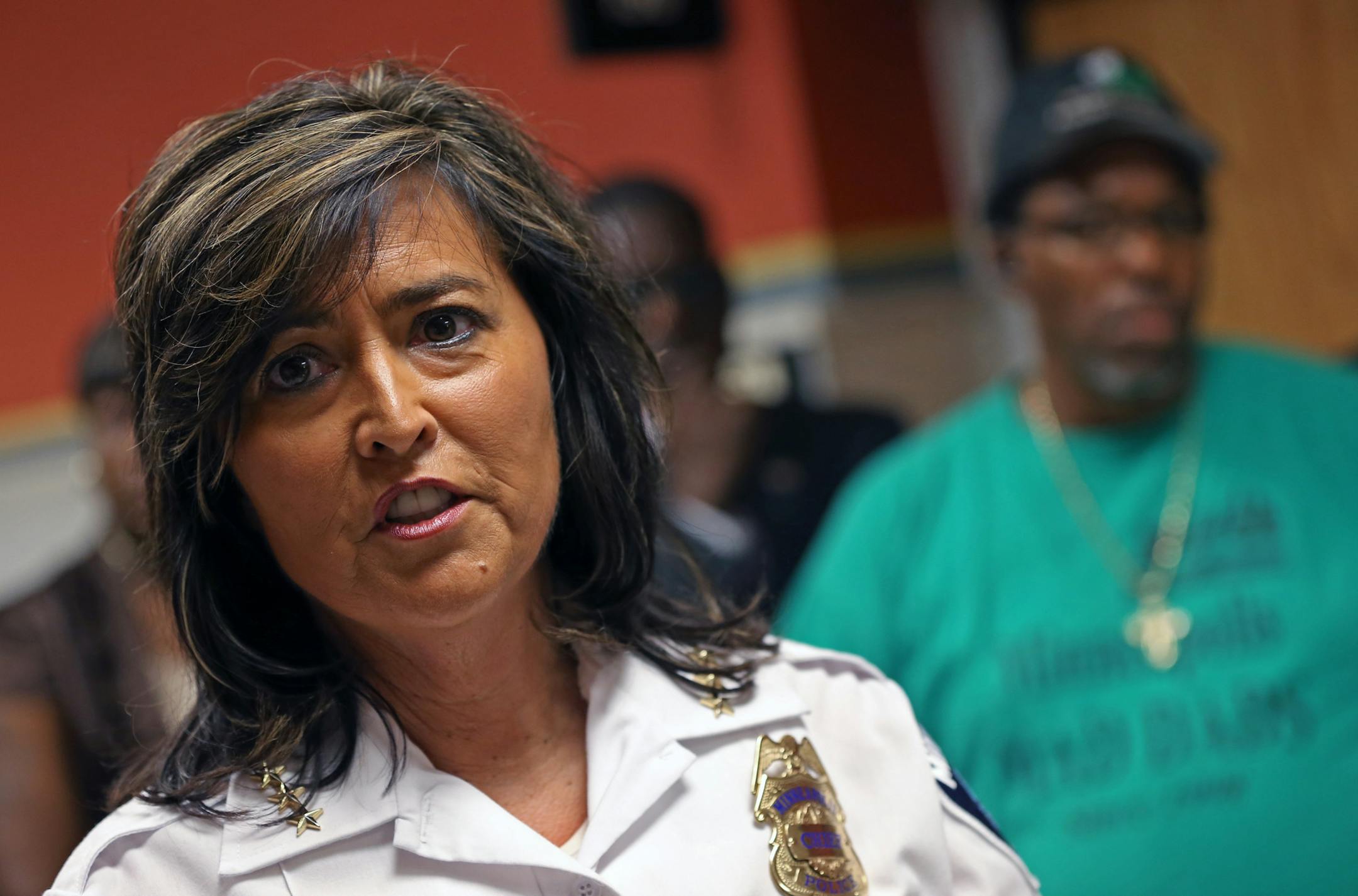 (left) Minneapolis Police Chief Janee Harteau talked to the media after she held a closed door meeting with community leaders on how to improve community relations with the police deptment. This is in response to recent incidents in Green Bay involving Minneapoils cops. The meeting was held at Harteau's office in city hall on 8/7/13.] Bruce Bisping/Star Tribune bbisping@startribune.com Janee Harteau/source.