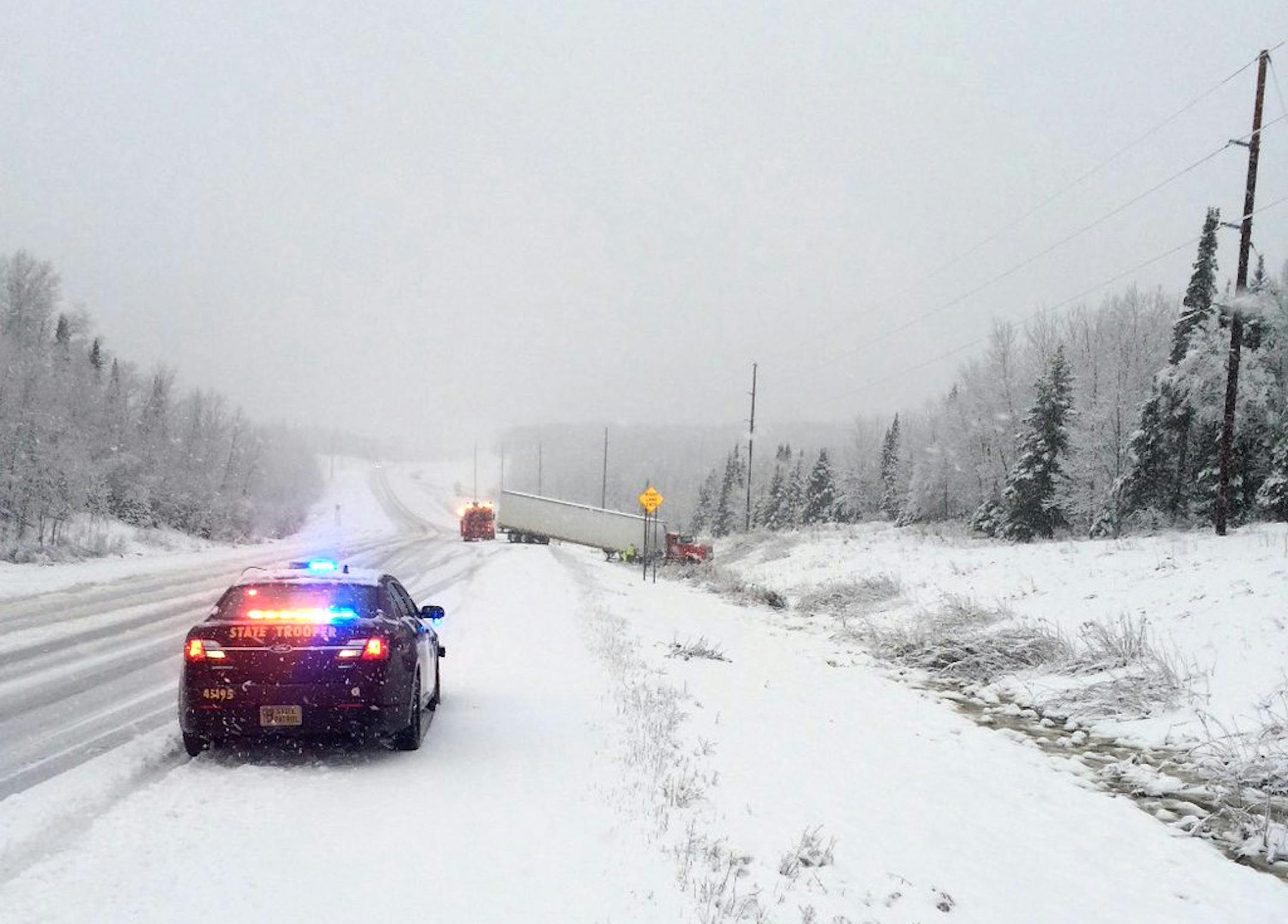 The Minnesota State Patrol shared this image from Highway 2, where it's down to one lane, and a semi has slid off the road near Duluth.