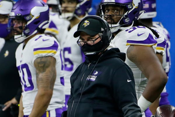 Minnesota Vikings head coach Mike Zimmer watches during the second half of an NFL football game against the Detroit Lions, Sunday, Jan. 3, 2021, in De