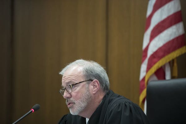 In court: Hennepin County District Judge Paul Scoggin presided over Beverly Burrell's sentencing.