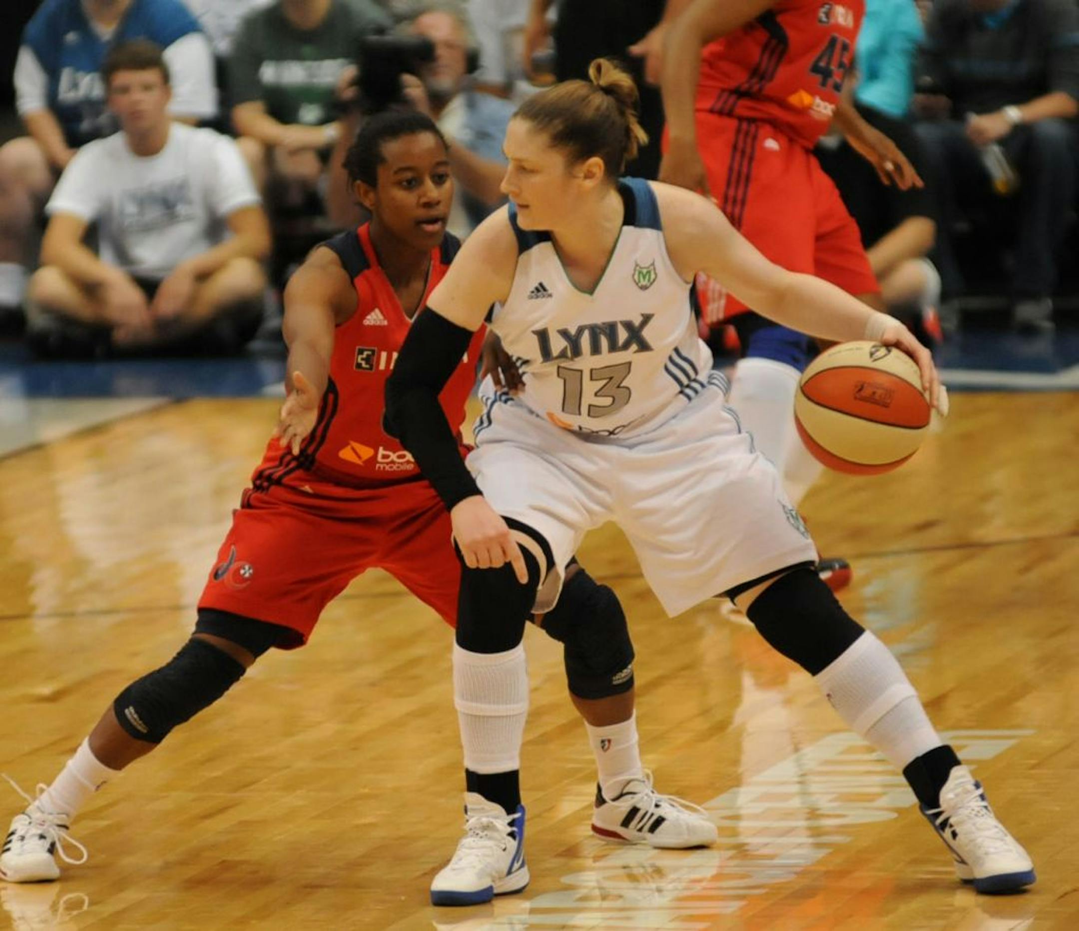The Minnesota Lynx hosted the Washington Mystics at Target Center August 17, 2012, to kick off the second half of the season. in the first quarter the Mystics Shannon Bobbitt guard the Lynx's Lindsay Whalen