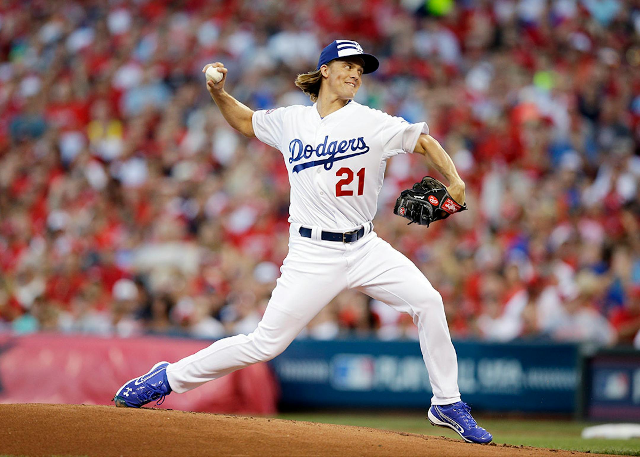 National League's Zack Greinke, of the Los Angeles Dodgers throws during the first inning of the MLB All-Star baseball game, Tuesday, July 14, 2015, in Cincinnati.