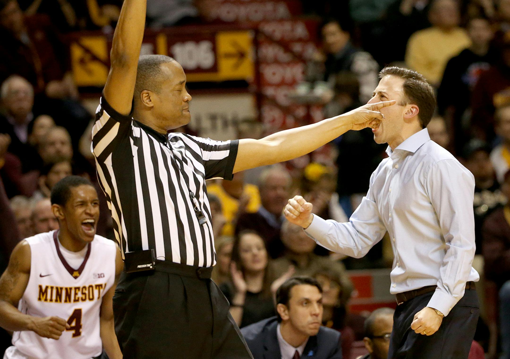 University of Minnesota head coach Richard Pitino, right, and DeAndre Mathieu (4) celebrated a five second turnover call on Purdue during the second half of the Gophers 62-58 win Saturday, Feb. 7, 2015, at Williams Arena in Minneapolis, MN.