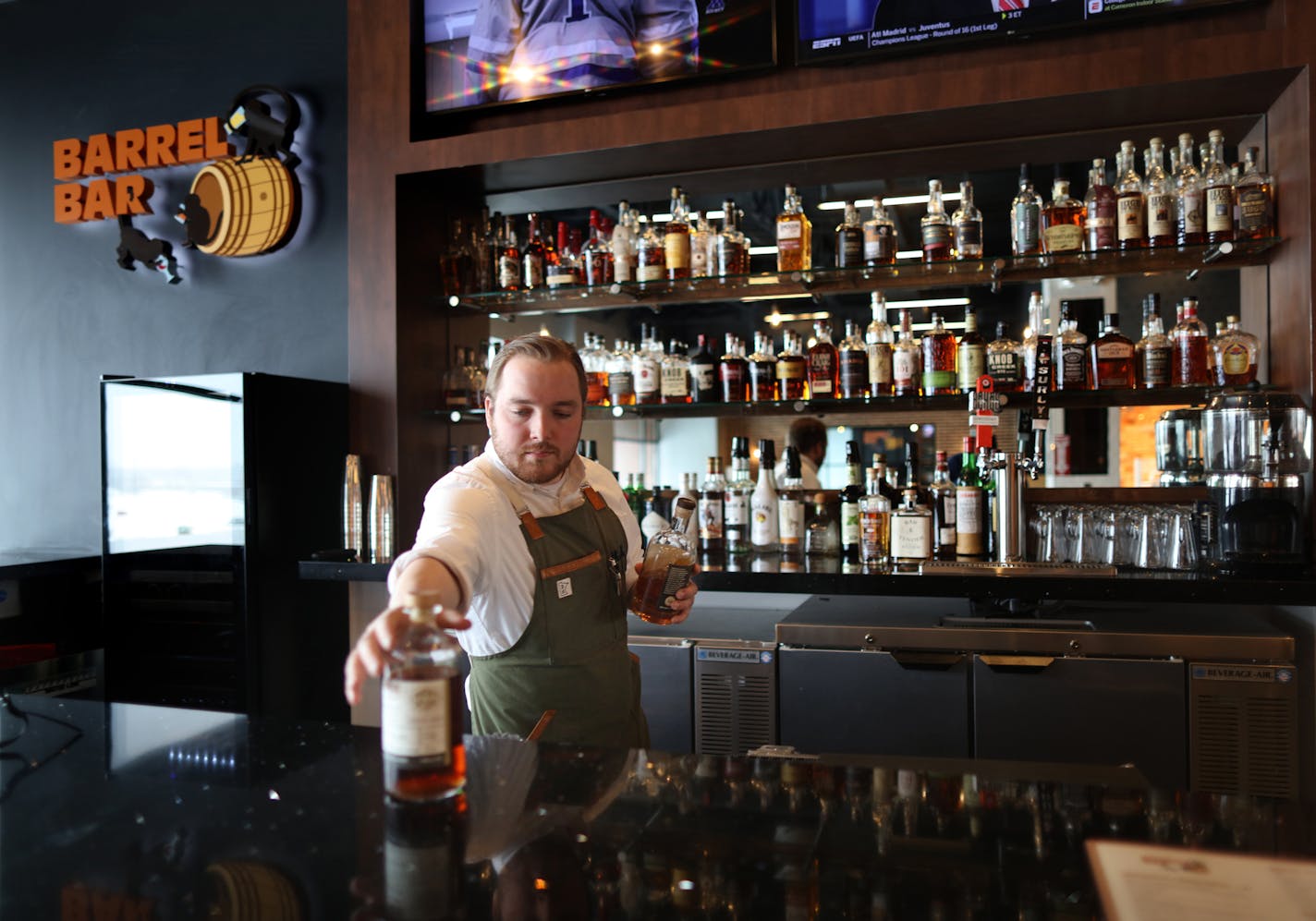 Joseph McGrath tends the Barrel Bar with its extensive whiskey offereings including several from Mimnnesota. Revolution Hall, is the new food hall at Rosedale shopping center in Roseville. ] David Denney &#x2022; Star Tribune Minneapolis, 022019