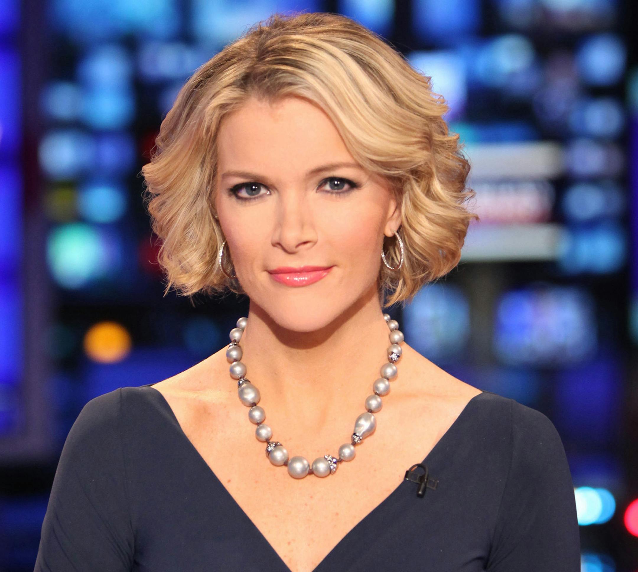 FILE - In this March 6, 2012 file photo provided by Fox News, Fox News anchor Megyn Kelly poses at the anchor desk at the Fox studios in New York. Kelly says she's offended by a male colleague's suggestion that children of working mothers don't do as well as families with stay-at-home moms. A study released this week showing that women are now the primary breadwinners in households with children ignited a sharp debate with two of Fox's most prominent women taking on male colleagues. In an electr