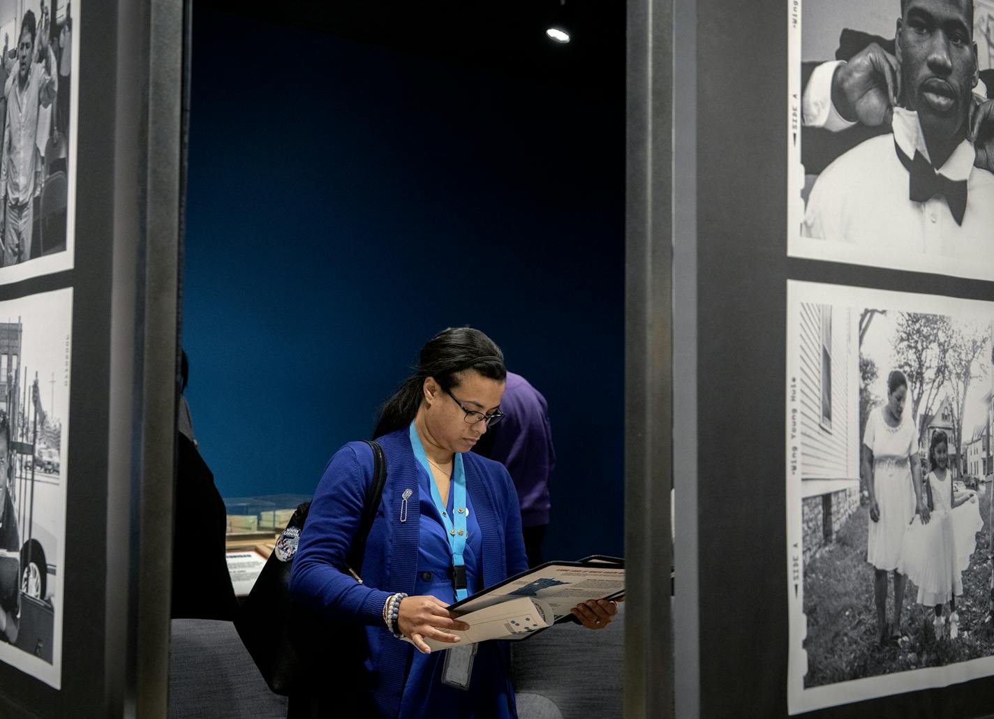 Kim Dobler sifted through information as she joined other YMCA Youth Intervention Services staff for equity training and a walk through the YMCA's new exhibit created by the science museum, Thursday, January 24, 2019 in downtown Minneapolis, MN. The Equity Innovation Center will offer equity leadership certification for corporate and civic sector leaders. ] ELIZABETH FLORES &#x2022; liz.flores@startribune.com