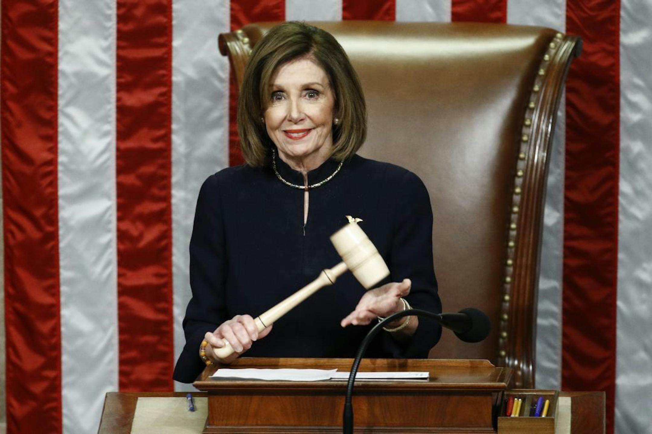 House Speaker Nancy Pelosi of Calif., holds the gavel as House members vote on the article II of impeachment against President Donald Trump, Wednesday, Dec. 18, 2019, on Capitol Hill in Washington.