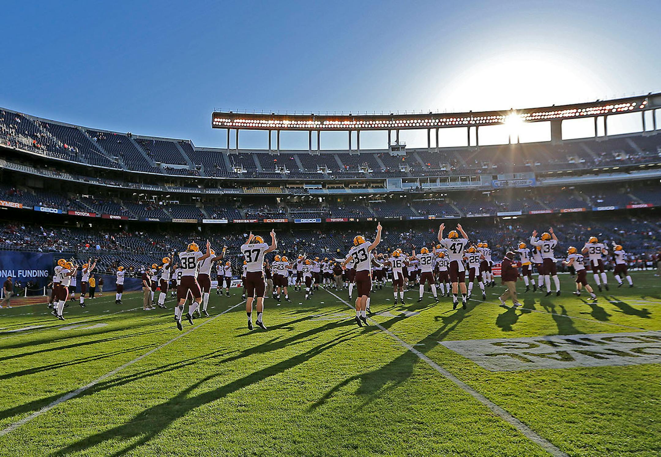 The Minnesota Gophers football team made their way to the center of the field before they took on Washington State at Qualcomm Stadium for the San Diego Holiday Bowl, Tuesday, December 27, 2016 in San Diego, CA.