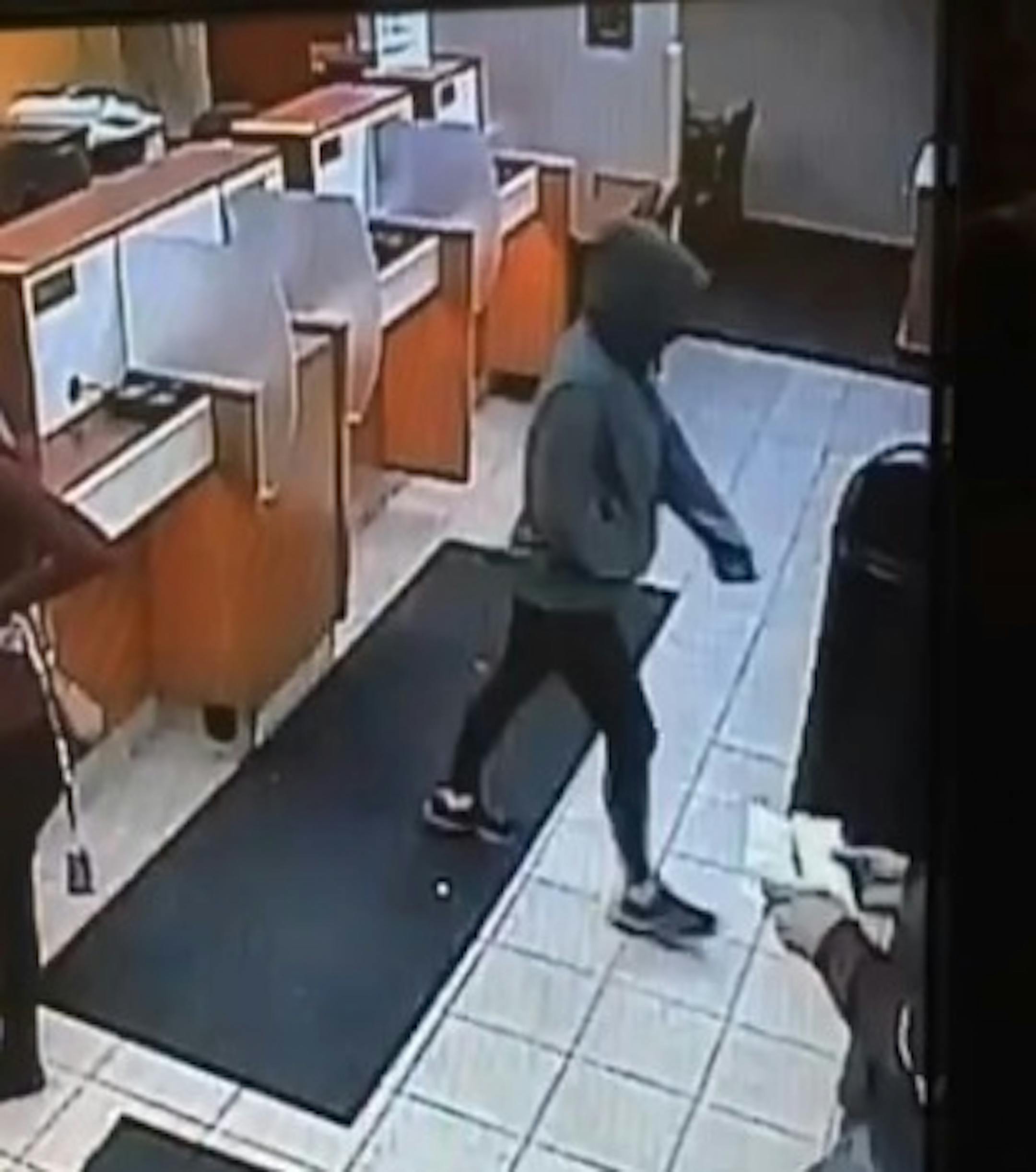 Surveillance image from bank robbery Saturday in Cub Foods in Maplewood.