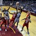 Minnesota Lynx and Washington Mystics players, including Minnesota's Sylvia Fowles (34) and Maya Moore (23), battled for a first half rebound with Was