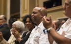 Acting chief Medaria Arradondo smiled as he was applauded after he was voted to be Minneapolis police chief by city council members on Friday, August 