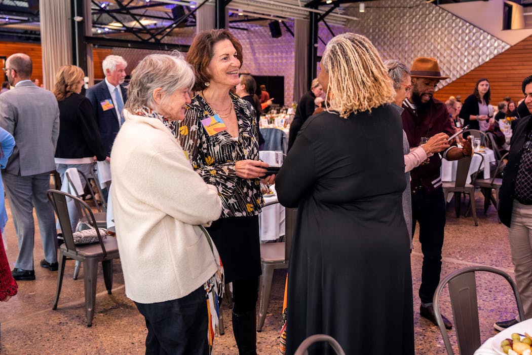 In October, Gail Rosenblum was named one of AARP-Pollen’s “50 Over 50” most accomplished leaders in Minnesota for her work in solutions journalism. She spoke here with fellow honoree, Dr. Joi Lewis, founder of the Healing Justice Foundation. At left, nominator and Inspired reader Leni de Mik.