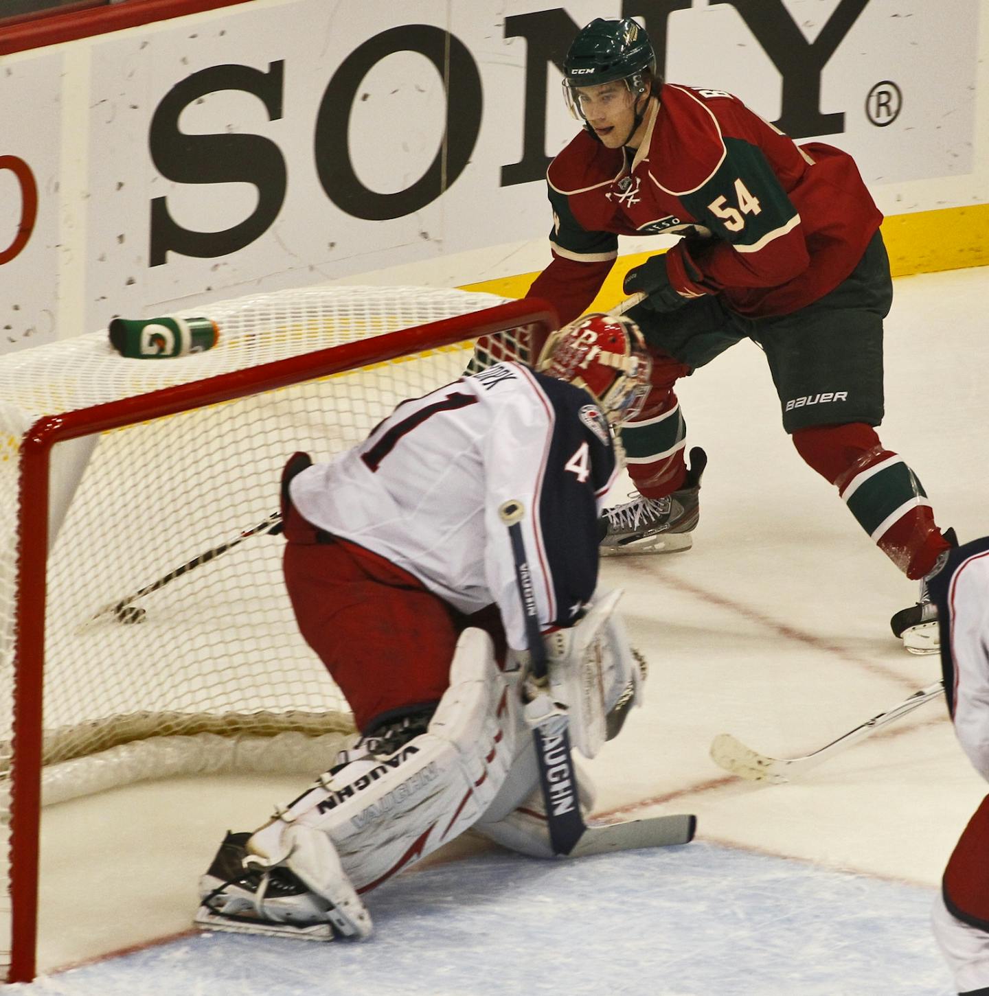 Wild forward Brett Bulmer (54)