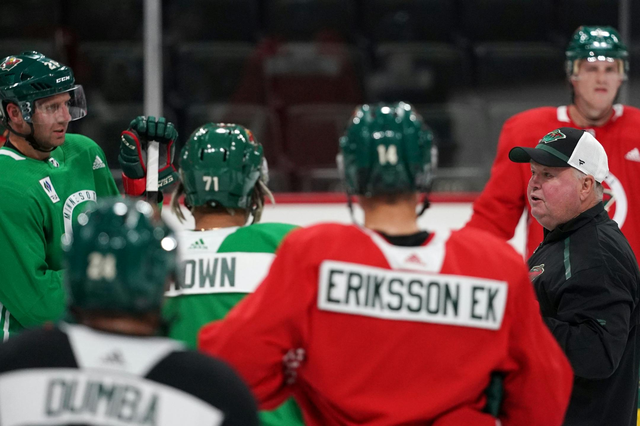 Minnesota Wild head coach Bruce Boudreau talked with his players between drills.