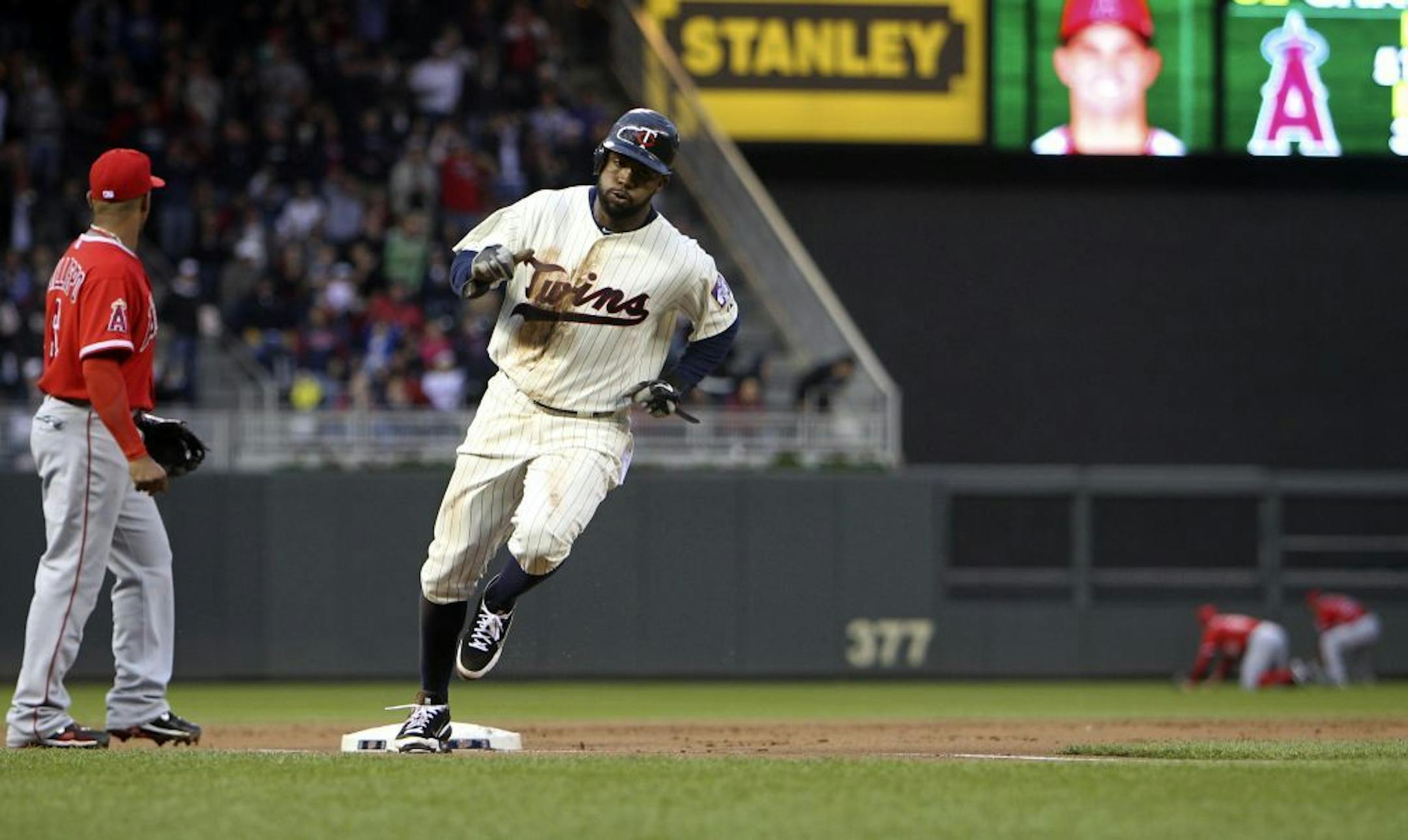 Denard Span rounded third and headed for home on a first-inning double by Alexi Casilla.