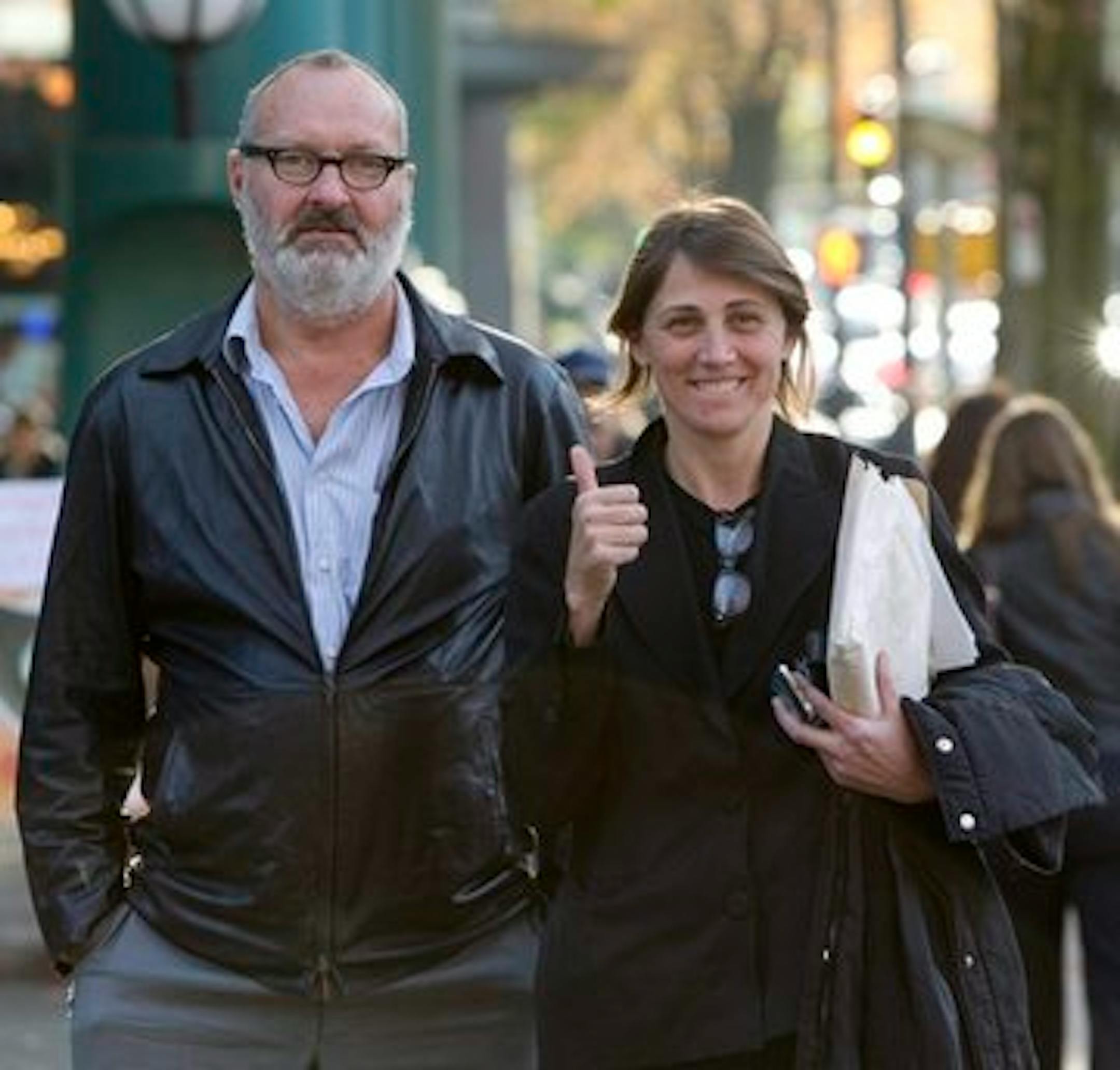FILE - In this Oct. 27, 2010 file photo, actor Randy Quaid, left, and his wife Evi are shown outside their lawyer's office in Vancouver. Santa Barbara Deputy District Attorney Anthony Davis says Evi Quaid failed to appear for a probation hearing Thursday, Dec. 16, 2010, and now faces a $100,000 arrest warrant.  (AP Photo/The Canadian Press, Jonathan Hayward, file)