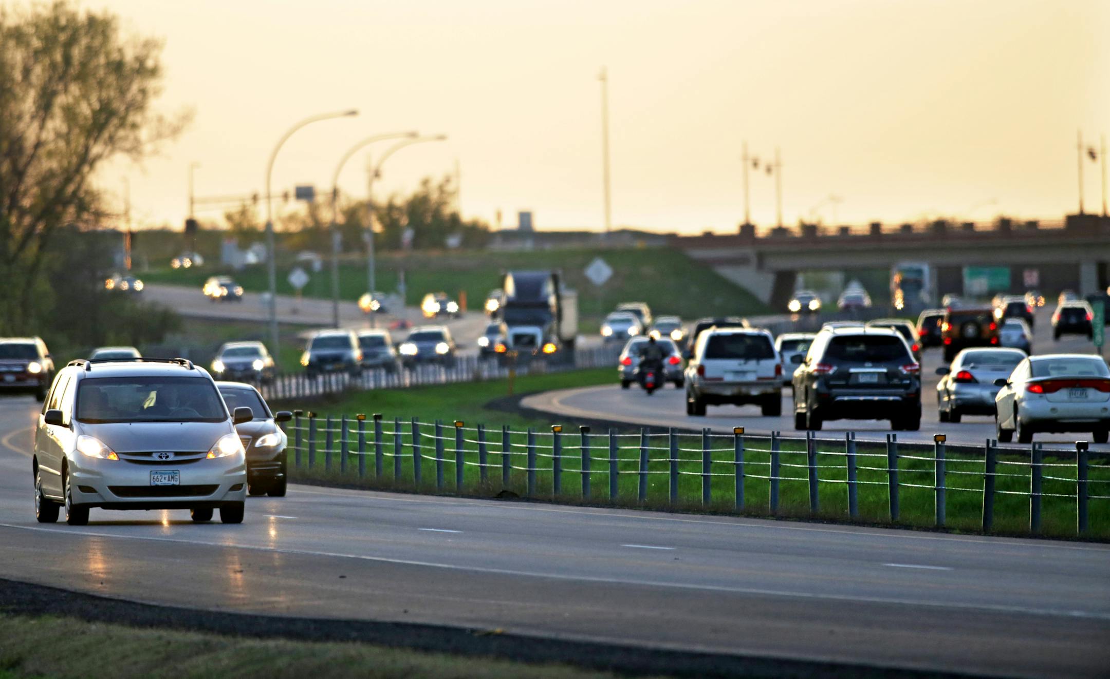 This photo shows traffic along Hwy. 10 just south of Main St. in Coon Rapids, MN. Between the traffic lanes one can see the cable median fence. ... as motorists head north or elsewhere for the Memorial weekend, some may notice the lowly cable median fences strung along almost 400 miles of Minnesota highways. The short cable fences, at minimal cost, are making travel safer for motorists by preventing careening vehicles from crossing medians into oncoming traffic. The cable barriers have been stru